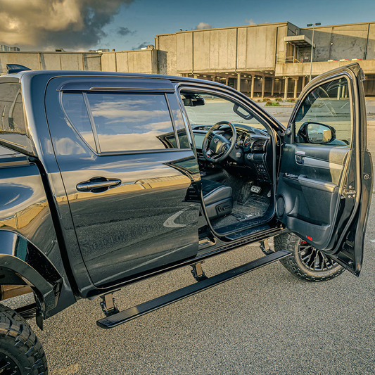 N80 HILUX ELECTRIC SIDE STEPS VIKOR INDUSTRIES